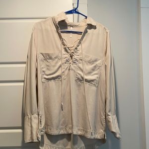 Small laced up free people neutral top.